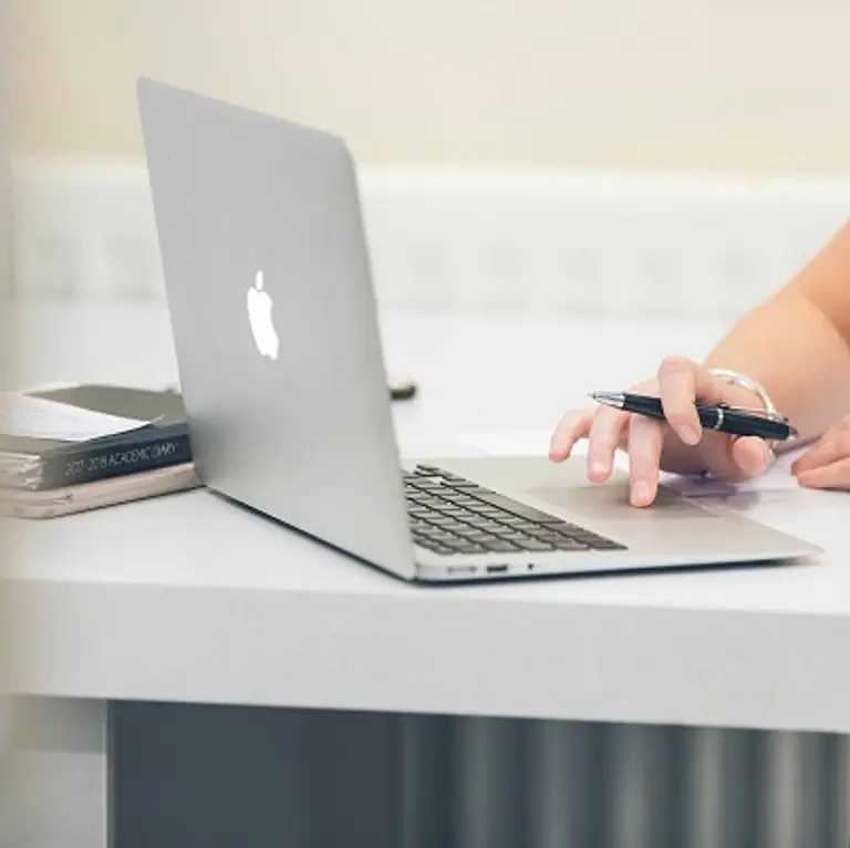 Hidden user with laptop