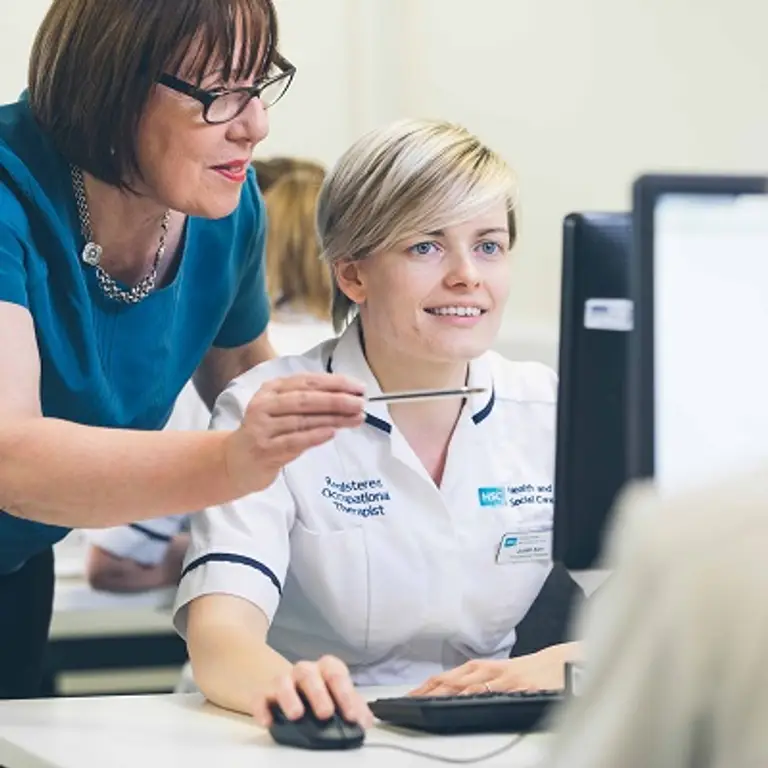 Librarian and healthcare professional working together